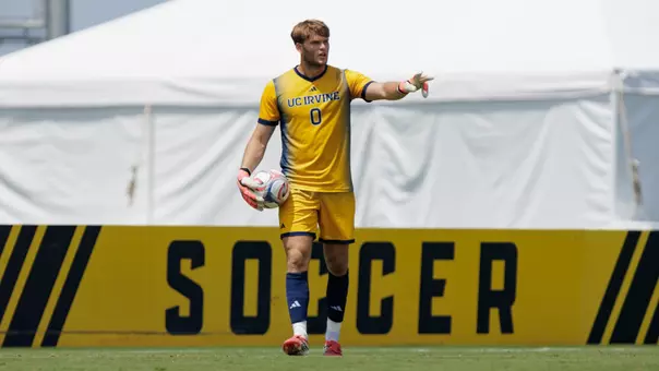 Scott Williams sets the play up in a men's soccer exhibition in 2026
