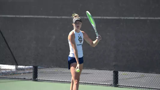 Lyna readies to serve