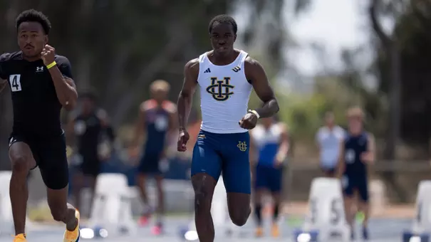 Justin Johnson mid-stride in the 100-meter dash