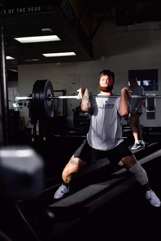 Jake Troxell lifting in the weight room