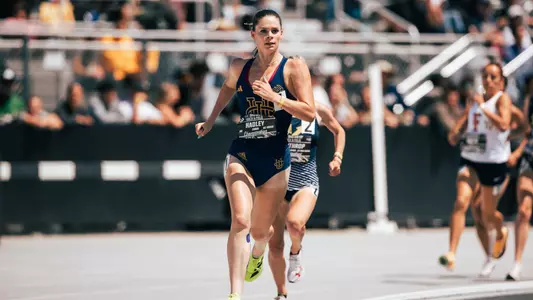Emma Hadley running on the track