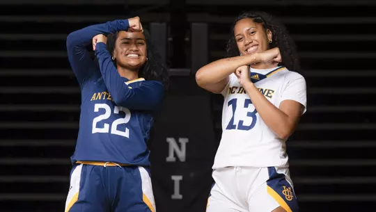 Reese Noa and Lani Stores pose in uniform