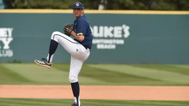 Danny Suarez winds up to pitch against Cal Poly