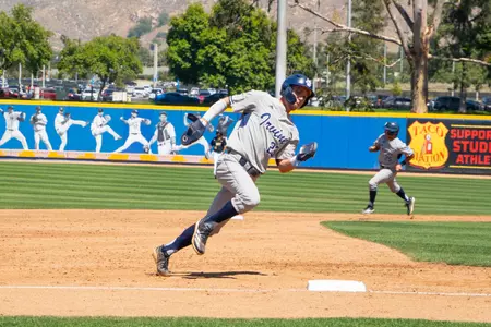 Frankie Carney rounds third heading for home with Alonso Reyes just behind him in Friday's 17-5 win at UC Riverside as shot by Elena Versage of UC Riverside Athletics
