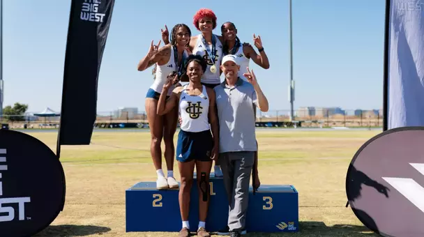 Heptathletes Jolie Robinson, Joy Anderson, Jazzmine Davis, Zharia Taylor and coach Jeff Perkins pose for a photo on the podium at the Big West Championships