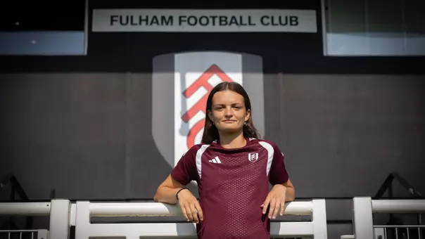 Women's soccer alum Sophie Gillies poses following her signing with Fulham FC