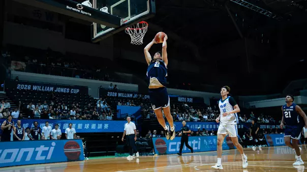 Harrison Carrington goes up for a dunk during their opener of the 2026 William Jones Cup vs. Chinese Taipei White in New Taipei City