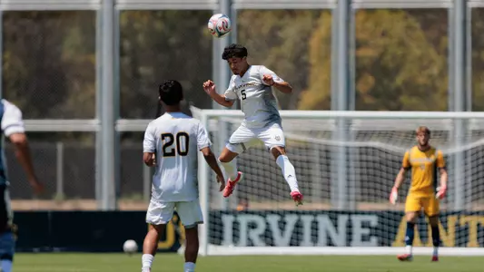 Gustavo Gonzalez heads a ball away in a 2026 preseason friendly