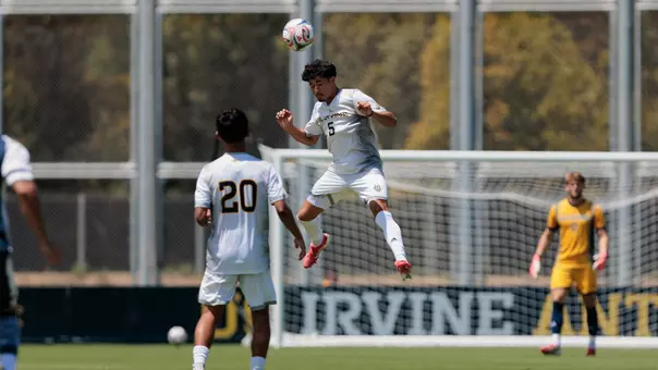 Gustavo Gonzalez heads a ball away in a 2026 preseason friendly