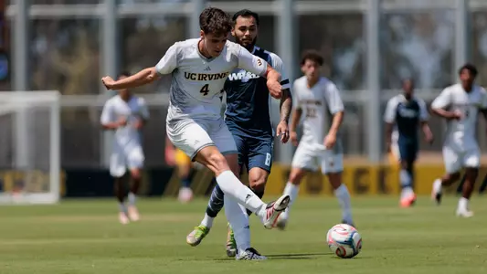 Mario Nordstrom plays a ball during a 2026 preseason friendly for UCI men's soccer