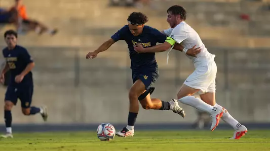 Isaiahs Gutierrez gets fouled hard by an Oregon State defender in a 2026 match in Anteater Stadium