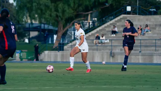 Olivia Stark dribbles through the midfield in a match vs. Utah Tech in 2026