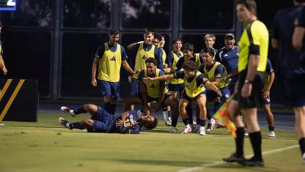 Isaac Powell celebrates his goal vs. Oregon State with his team in a match in Anteater Stadium in 2026