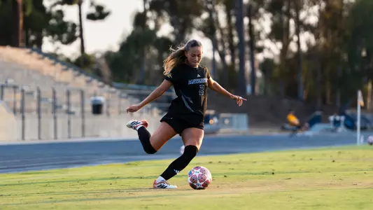Malaina Duro winds up for a cross in an exhibition vs. Arizona in Anteater Stadium
