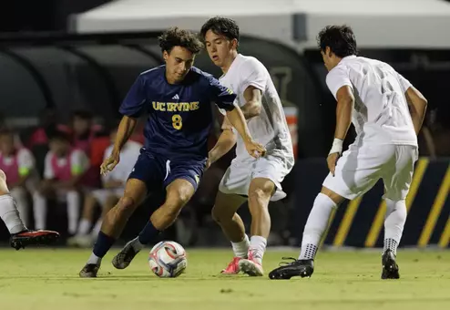 Isaiahs Gutierrez carves through a slew of UNLV defenders in a 2026 match at Anteater Stadium