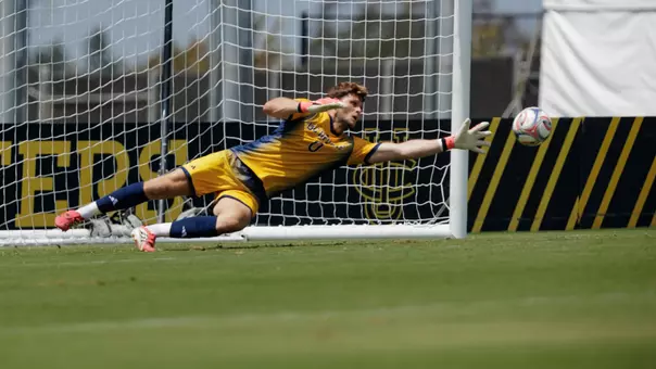 Scott Williams stretches out for a save in a preseason exhibition in 2026