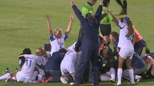 UCLA celebrates a double OT win at Stanford