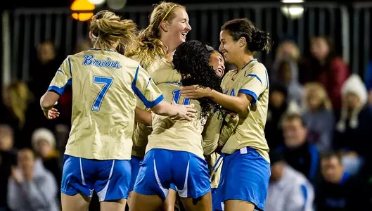 The Bruins celebrate Caprice Dydasco's goal