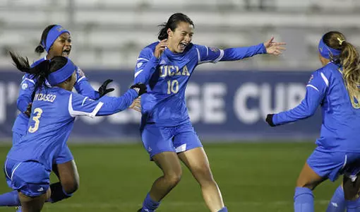 UCLA's Kodi Lavrusky celebrates with teammates (AP Photo/Ellen Ozier)