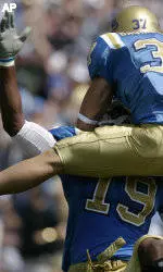 Olson, UCLA Boomer The Sooners 41-24