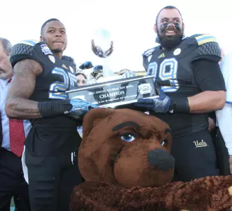 UCLA's Brandon Sermons, left, and Jordan Barrett