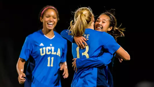 UCLA celebrates one of seven goals against Harvard (photo by Scott Chandler