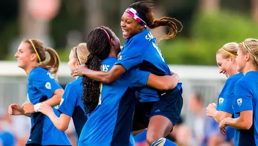 Taylor Smith celebrates with Darian Jenkins
