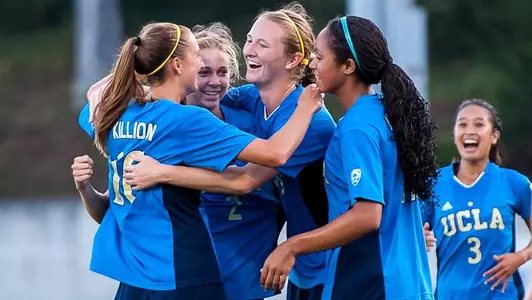Sam Mewis and the Bruins celebrate after scoring the game-winner