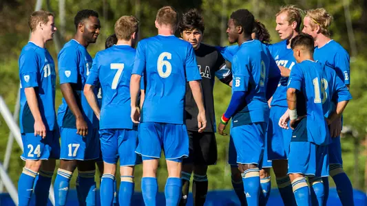 Team Huddle (Photo by Scott Chandler)