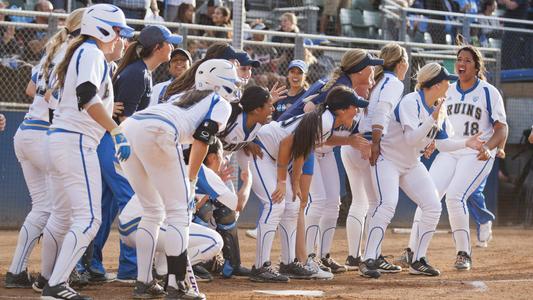 UCLA celebrates at home plate (photo by Katie Meyers)