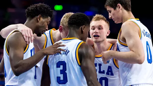 UCLA men's basketball huddle