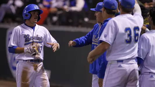 Daniel Rosica Greeted by Teammates (Photo by Katie Meyers)
