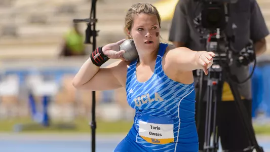 Torie Owers shot put action versus USC