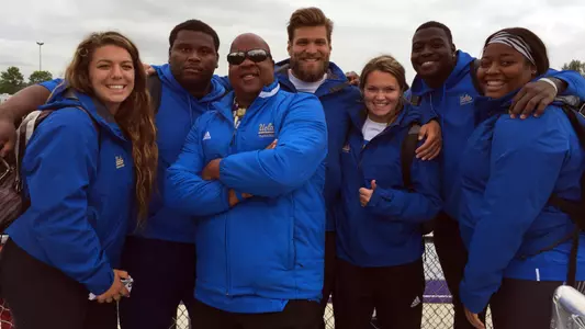 Coach John Frazier with the UCLA throws group