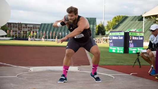 Nicholas Scarvelis competes in the shot put at the NCAA Championships.