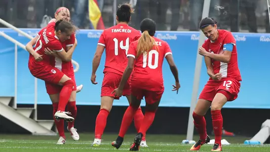 Jessie Fleming celebrates a Canada goal (photo courtesy Getty Images)
