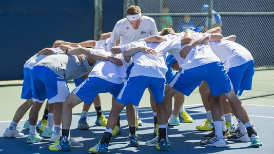 Team Huddle (Photo: Katie Meyers)