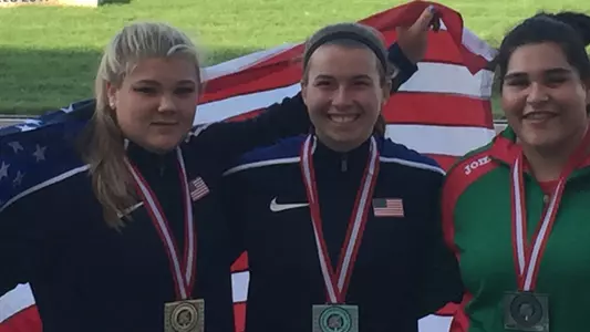 Alyssa Wilson (left) won gold in the shot put at the Pan Am Juniors