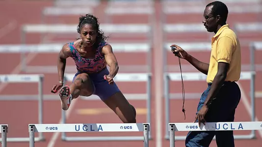 Bob Kersee coaching Gail Devers (photo courtesy Getty Images)