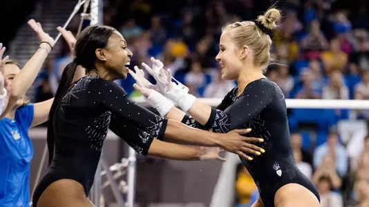 Nia Dennis and Madison Kocian