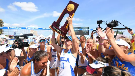 Savvy Simo Hoists the 2019 NCAA Championship Trophy