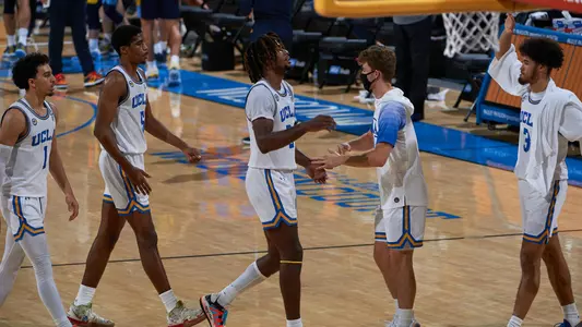 Chris Smith, Jalen Hill and Russell Stong