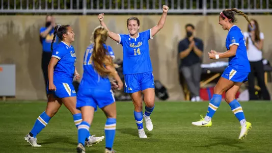 Bruins celebrate Sunshine Fontes' goal (photo by Percy Anderson)