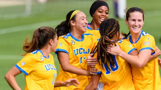 UCLA celebrates a goal by Mia Fishel