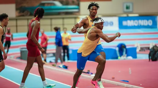 Ismail Turner receives baton from Sam Herenton (Jan. 21)