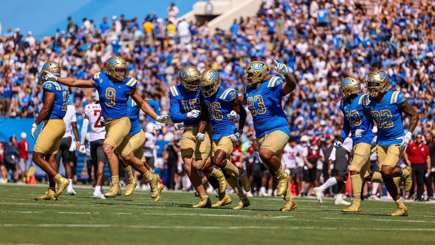 The Bruin defense celebrates