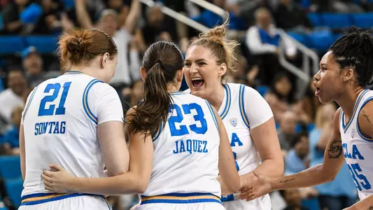 Team celebrating together_vs. Princeton (Nov. 17, 2023)