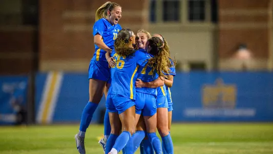 UCLA celebrates Ally Cook's goal vs. USC