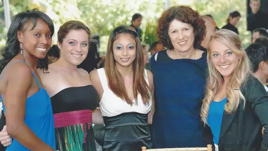 Rita Rothman with members of the 2011 UCLA Gymnastics team