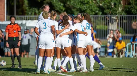 UCLA celebrates a goal by Jackie Gilday